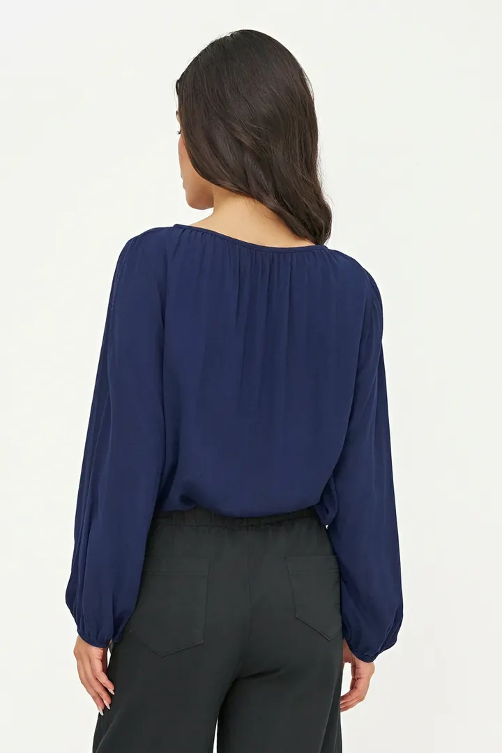 Navy blouse, back pose