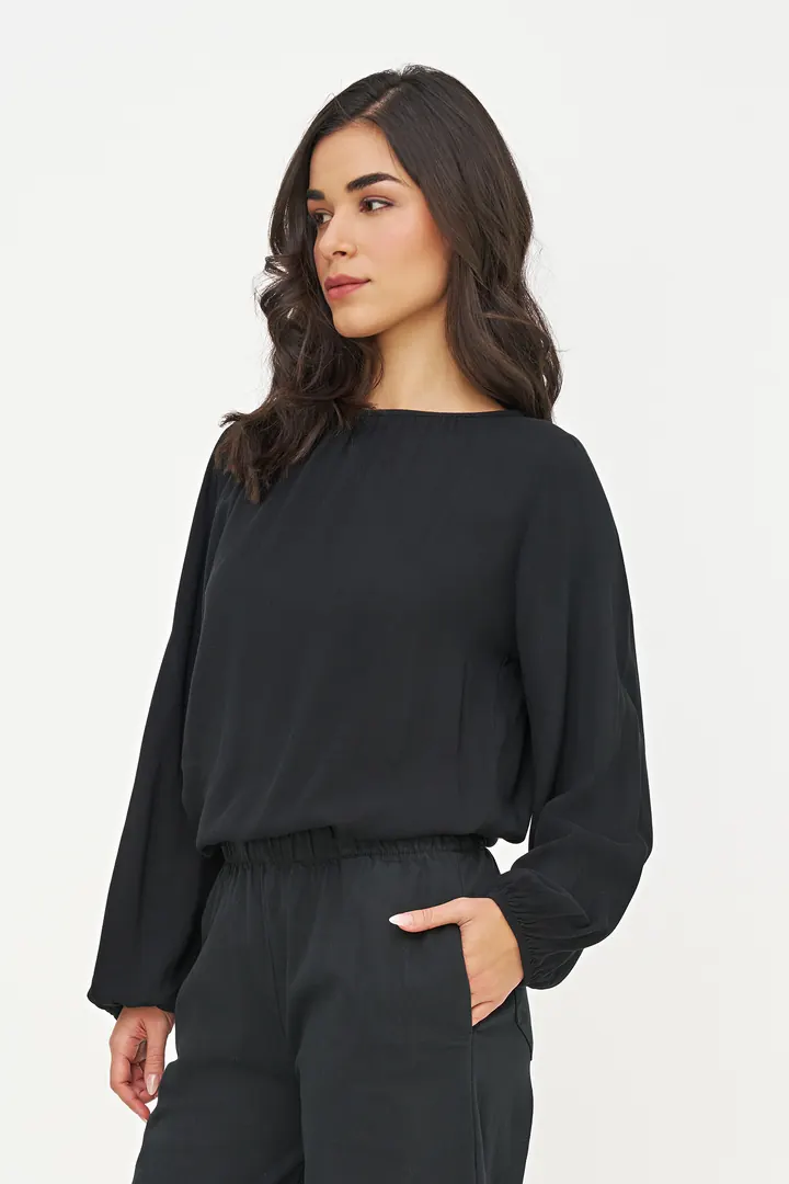 Black blouse, three-quarter pose
