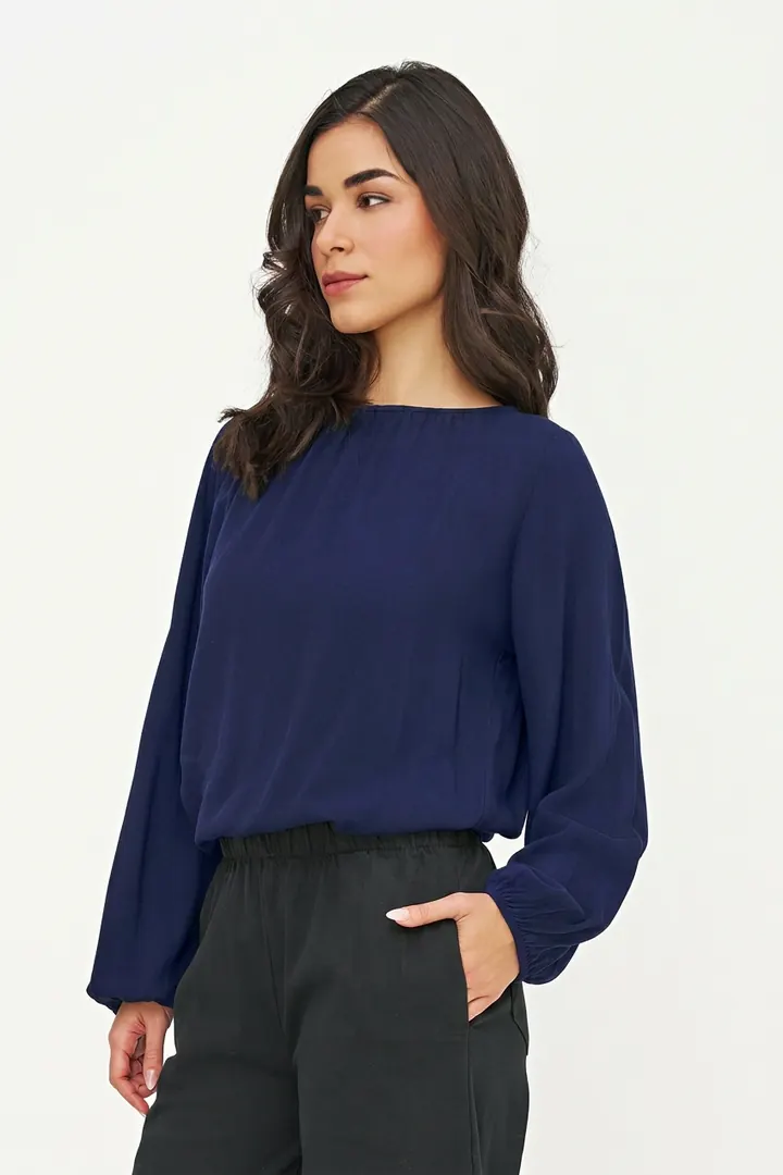 Navy blouse, three-quarter pose